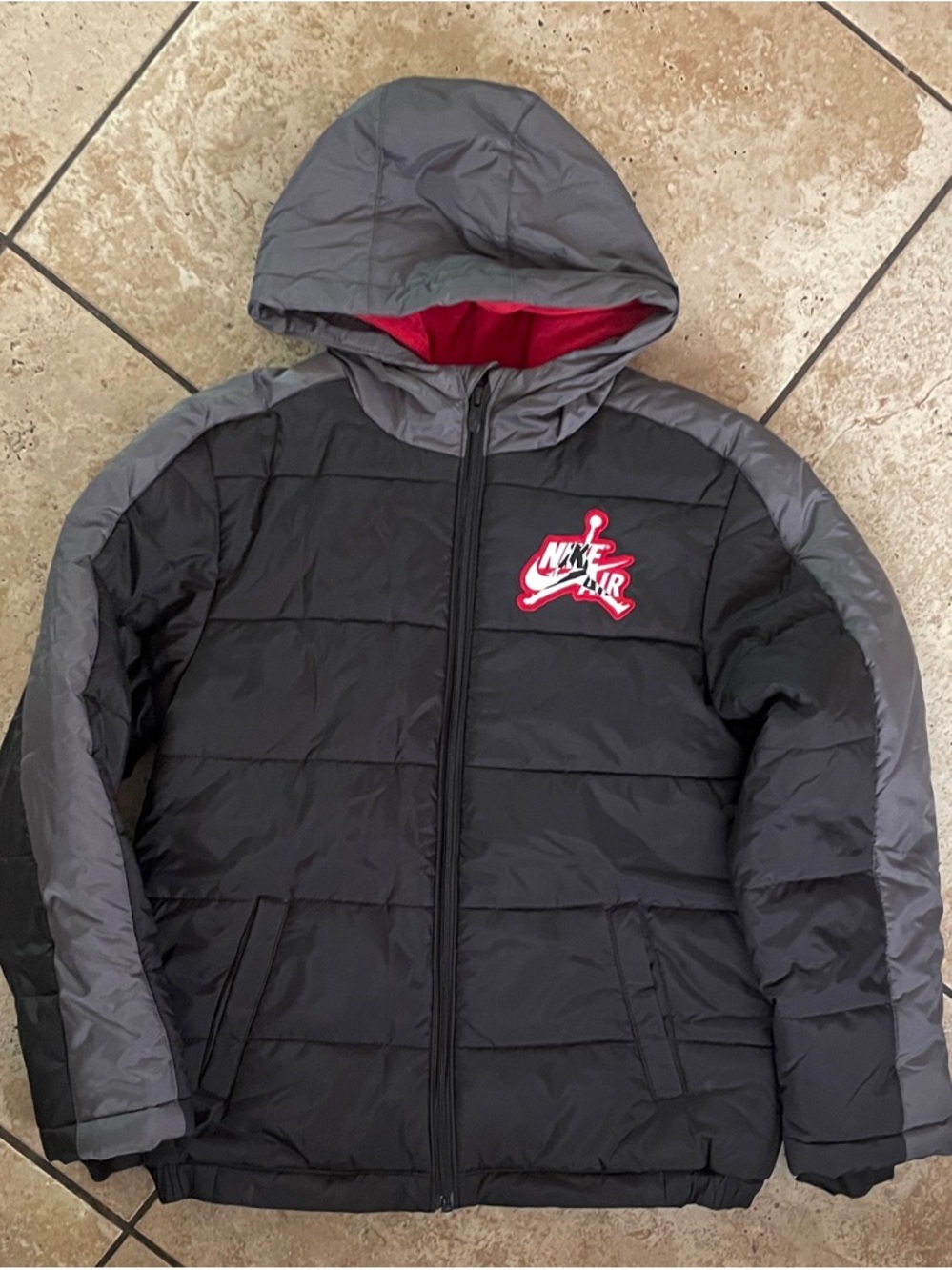 RNike Air Black & Gray Boy’s Puffer Jacket with Red Accent
